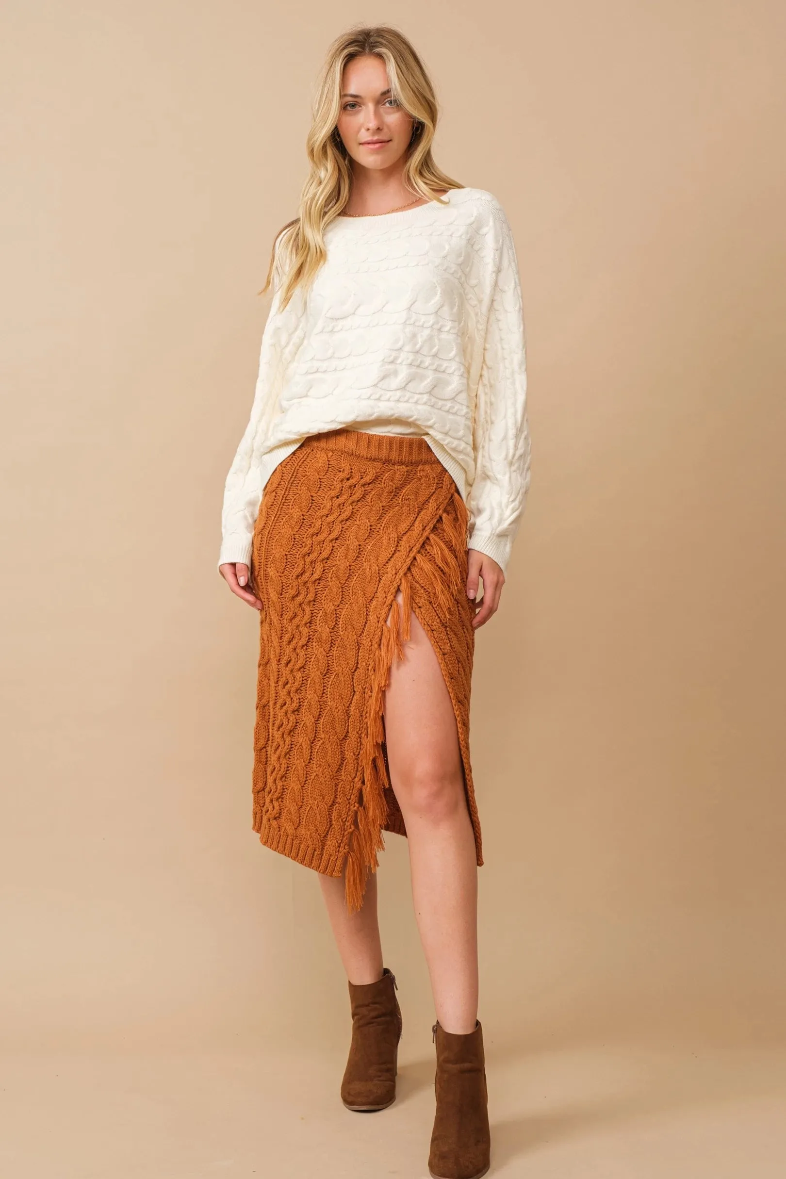 Horizontal cable knit dolman sleeve sweater