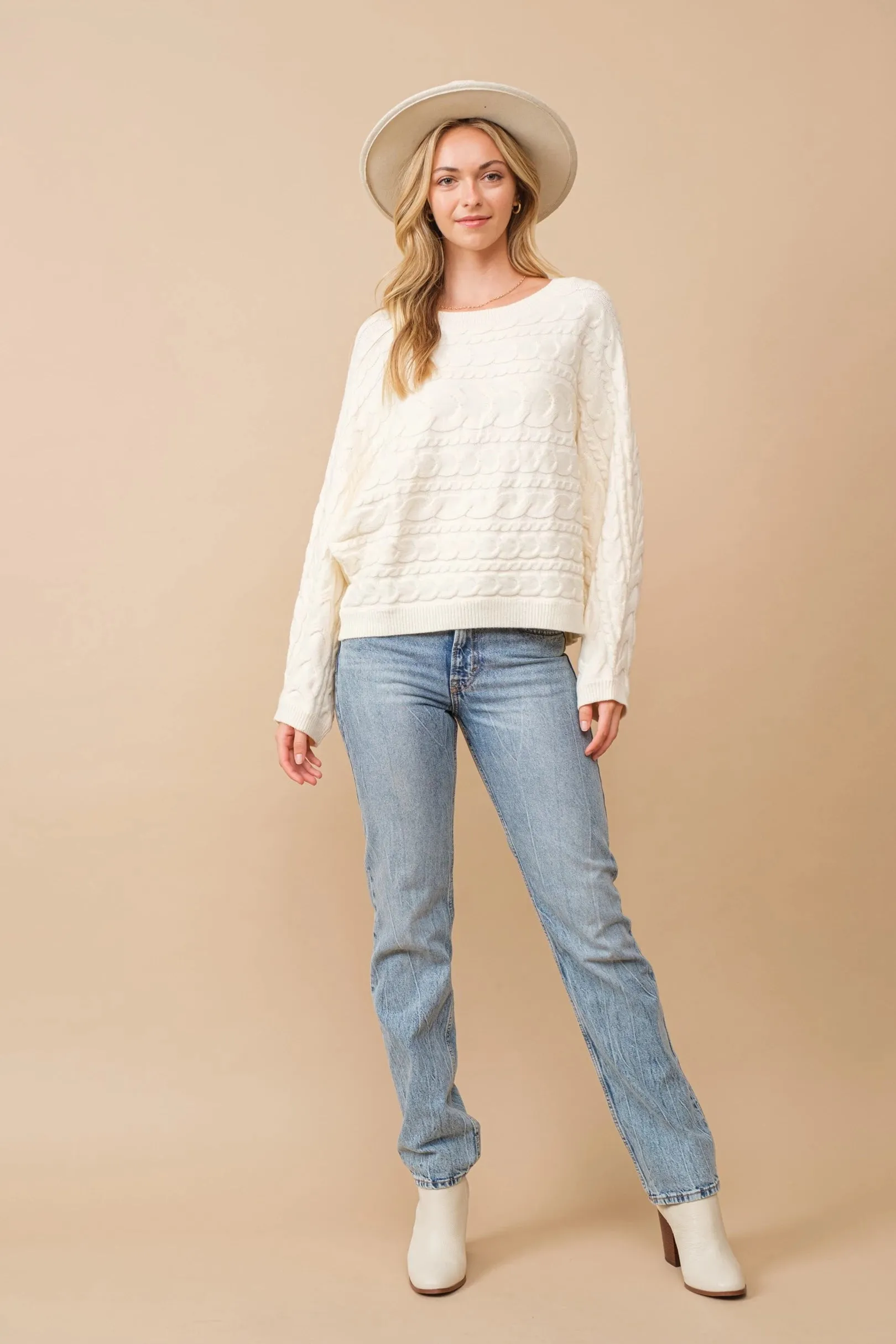 Horizontal cable knit dolman sleeve sweater